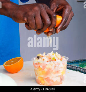 Food: Man making conch salad Stock Photo