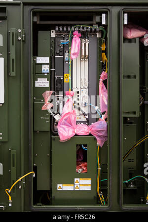 BT fiber optic and telephone cabinet revealing cable connections providing rural broadband Stock Photo