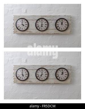 Three hotel travel clocks set in South Africa, London, New York time zones Stock Photo