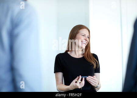 Laughing businesswoman Stock Photo