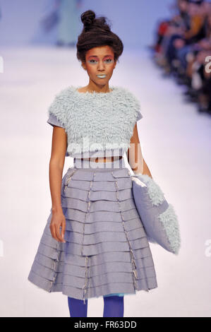 Kiev, Ukraine. 21st Mar, 2016. A model presents a creation by Ukrainian designer Olga May, during the Ukrainian Fashion Week. The event presents Autumn/Winter 2016-2017 collections by Ukrainian and international designers from 17 to 23 March. © Vasyl Shevchenko/Pacific Press/Alamy Live News Stock Photo