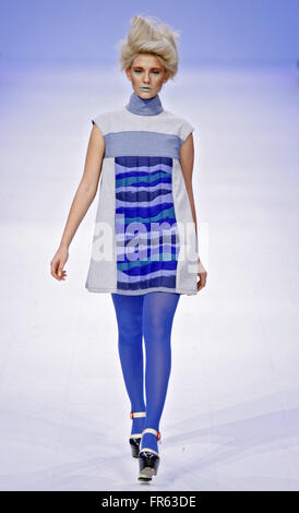 Kiev, Ukraine. 21st Mar, 2016. A model presents a creation by Ukrainian designer Olga May, during the Ukrainian Fashion Week. The event presents Autumn/Winter 2016-2017 collections by Ukrainian and international designers from 17 to 23 March. © Vasyl Shevchenko/Pacific Press/Alamy Live News Stock Photo