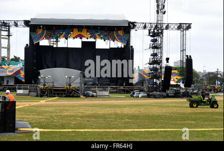 Havana, Cuba. 21st March, 2016. Workers are seen near the stage that has been assembled at the Ciudad Deportiva in Havana, Cuba in preparation for the upcoming Rolling Stones concert. A crowd of around 500,000 is expected for the free event which is scheduled for March 25, 2016, having been delayed from March 20, 2016 due to the arrival in Havana of U.S. President Barack Obama on that date. The band shipped 61 containers with an estimated 500 tons of equipment to Cuba in order to make the unprecedented concert possible. Credit:  Paul Hennessy/Alamy Live News Stock Photo