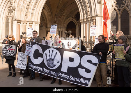 London UK 22nd March 2016. Supporters of women deceived into long term intimate relationships with undercover police officers gather outside the Royal Courts of Justice in a solidarity picket at the start of a preliminary hearing into a Public Inquiry into Undercover Policing. The preliminary hearing will determine how the inquiry will be conducted. Police authorities have asked that the public inquiry keep some evidence secret, but the legal teams of the women who are taking action argue that all evidence should be examined in public. Credit: Patricia Phillips/Alamy Live News Stock Photo