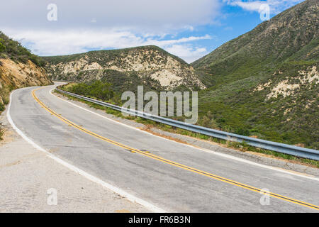 Long highway road bends through the Angeles National Forest above LA, California. Stock Photo