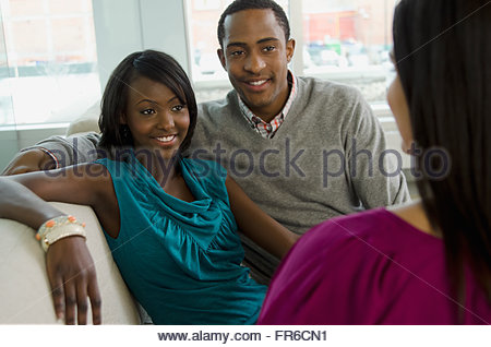 designer discussing with couple