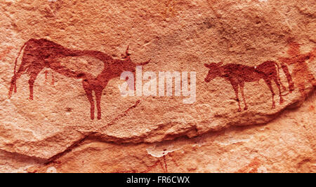 Ancient rock paintings in Sahara Desert, Tadrart, Algeria Stock Photo