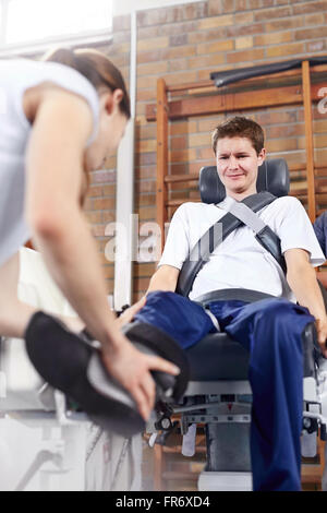 Man receiving physical therapy Stock Photo