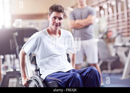 Portrait man in wheelchair at physical therapy Stock Photo