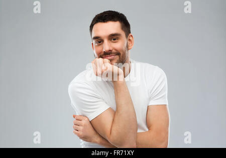smiling man over gray background Stock Photo