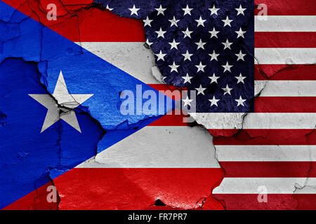 flags of Puerto Rico and USA painted on cracked wall Stock Photo