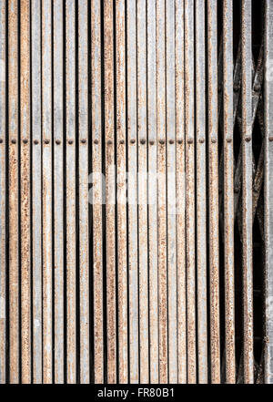 Metal concertina shutter on shop in Spain Stock Photo