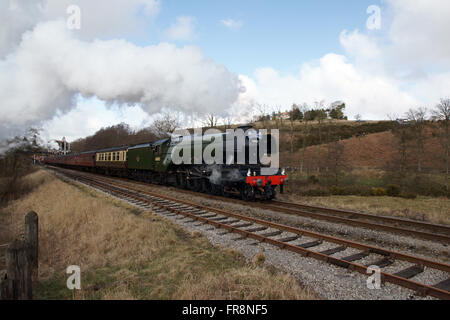 Flying Scotman locomotive running south of Goathland station under full steam on the North Yorkshire Moors Heritage Railway Stock Photo