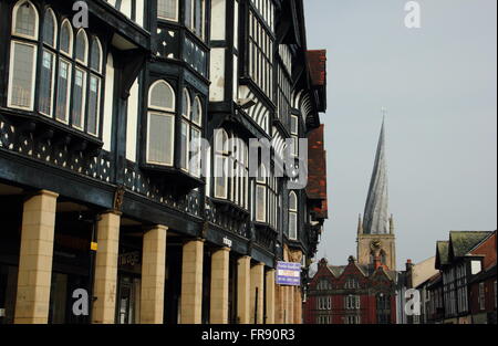 Black and white buildings on Knifesmithgate looking to the twisted spire of St Mary and All Saints Church, Chesterfield UK Stock Photo