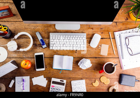 Desk with various gadgets and office supplies. Flat lay Stock Photo