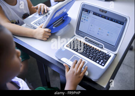 Individual students using computers at the Municipal School New Hope Stock Photo