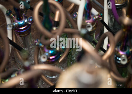 Close-up Of Several Hookahs Lined Up In A Cafe Bar Stock Photo