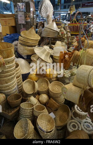 handicraft hat and baskets made from woven bamboo, sold in Warorat market, Chiang Mai, Thailand Stock Photo