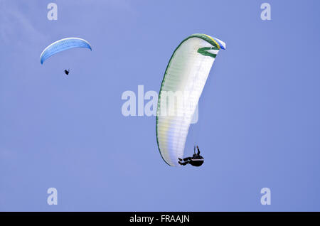 Practice of paragliding in the Sao Conrado Beach - south of the city Stock Photo