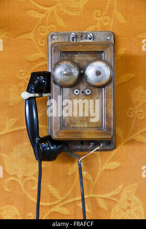 Exposed old phone in the park pavilion Bernardino Mario Ramos Stock Photo