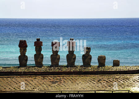 Seven Moai Ahu Nau Nau at Anakena Beach - Easter Island Stock Photo