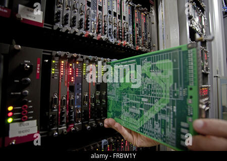 Detail of plaque on central servers and processors in telecommunications carrier Stock Photo