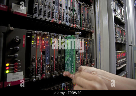 Detail of plaque on central servers and processors in telecommunications carrier Stock Photo