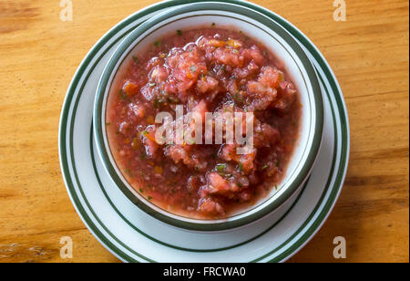 Pico de Gallo, a Mexican side dish made from tomatoes, onions, garlic, cilantro, jalapeno peppers, and lime juice Stock Photo