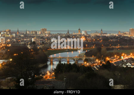 Skyline of the city of Aberdeen in Scotland, UK, at night with the River Dee in the foreground and the North Sea in background Stock Photo