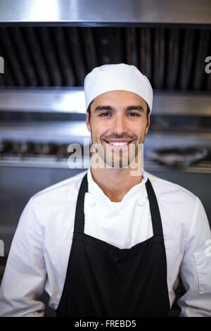 Handsome chef looking at camera Stock Photo