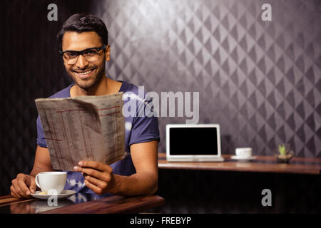 Man reading the newspaper Stock Photo