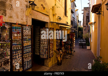 Old town Chania narrow street with souvenir shops, island Crete, Greece Stock Photo