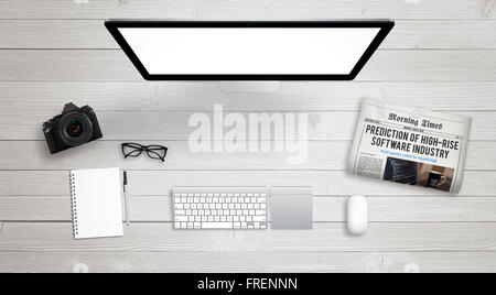 Isolated computer display for mockup on work desk with keyboard, mouse, newspaper, coffee, camera, notebook, glasses, pencil. Stock Photo