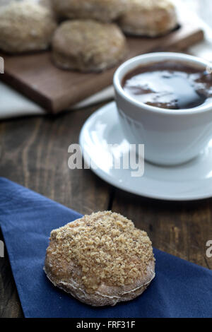 Homemade Easter buns on wooden table, close up Stock Photo