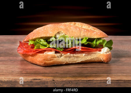 sandwich salami, gorgonzola and salad Stock Photo