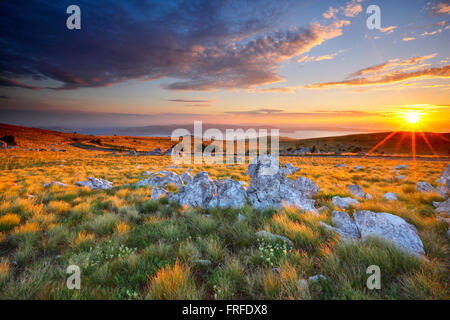 Sunset mountain landscape, View to island Krk from Velebit in Croatia. Stock Photo