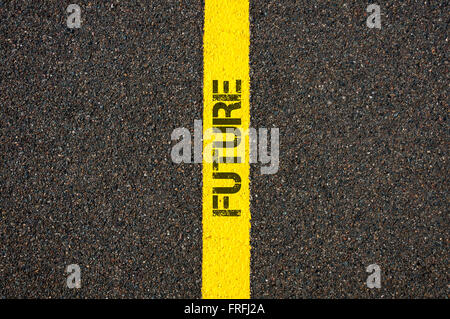 Road marking yellow paint dividing line with word FUTURE, concept image Stock Photo