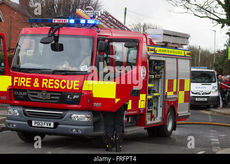 Hesketh Bank. Lancashire, UK 22nd March, 2016.  HSBC Bank robbers have escaped after carrying out an early morning raid in Lancashire. The Police received reports of the attack on the premises  on Station Road in Hesketh Bank at 09:10 this morning, as local residents in the normally sleepy village called the Fire & Rescue Brigade to attend a blazing BMW. The offenders fled the scene after abandoning their vehicles after setting them on fire. A police cordon was in place while officers investigated the robbery crime scene. Stock Photo