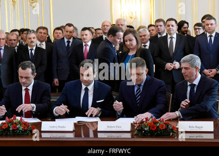 Bratislava, Slovakia. 22nd Mar, 2016. The chairmen of four Slovak political parties (from left) Radoslav Prochazka, Andrej Danko, Robert Fico and Bela Bugar signed a coalition agreement today following a recent general election. Prime Minister Robert Fico's Smer-Social Democracy (Smer-SD) will have the strongest representation in the government in Bratislava, Slovakia, March 22, 2016. © Martin Mikula/CTK Photo/Alamy Live News Stock Photo