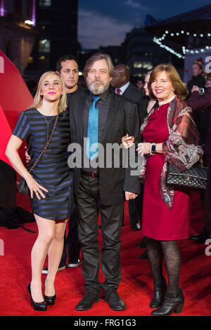 London, UK. 22 March 2016. Mark Hamill with daughter Chelsea Hamill (left) and wife Marilou York (right). Warner Bros. Pictures presents the European Premiere of Batman v Superman, Dawn of Justice. The movie, directed by Zack Snyder, stars Ben Affleck as Batman/Bruce Wayne and Henry Cavill as Superman/Clark Kent in the characters’ first big-screen pairing. The movie opens in cinemas on 25 March 2016. Credit:  Vibrant Pictures/Alamy Live News Stock Photo