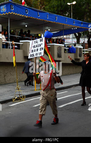 La Paz, Bolivia - March 22 2016: A man dressed up as the famous Mexican TV character El Chavo from the popular sitcom El Chavo del Ocho takes part in parades during events to commemorate the Day of the Sea / Dia del Mar. Every year on March 23rd Bolivia celebrates the Day of the Sea, a patriotic event to remember the loss of its coastal Litoral Province as a result of the War of the Pacific with Chile. Credit:  James Brunker / Alamy Live News Stock Photo