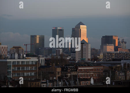 Canary Wharf financial district seen from Hackney at dusk, incl Canada Square 1 and HSBC tower. Stock Photo