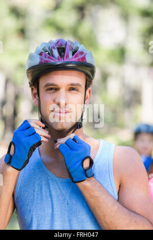 Portrait of young man wearing helmet Stock Photo