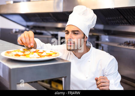 Pizza chef making pizza Stock Photo