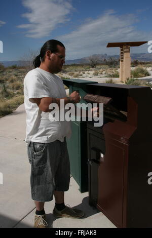 Man Recycling plastic bottle Stock Photo