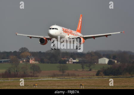 Low-cost airline Easyjet Airbus A320-200 G-EZWE landing at London Luton Airport, UK Stock Photo