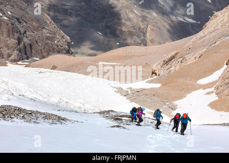 Trekking in Himalaya Hikers Walking Up on Glacier Stock Photo