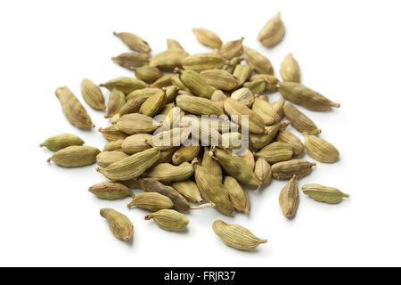Heap of green cardamom seeds on white background Stock Photo