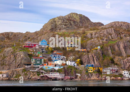 'The Battery' a neighbourhood in St. John's, Newfoundland, Canada, seen from across St. John's Harbour in the spring. Stock Photo