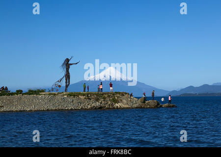 PUERTO VARAS, CHILE - NOVEMBER 11, 2015: Metal sculpture of a woman at Puntilla in Puerto Varas on the shore of Llanquihue Lake Stock Photo
